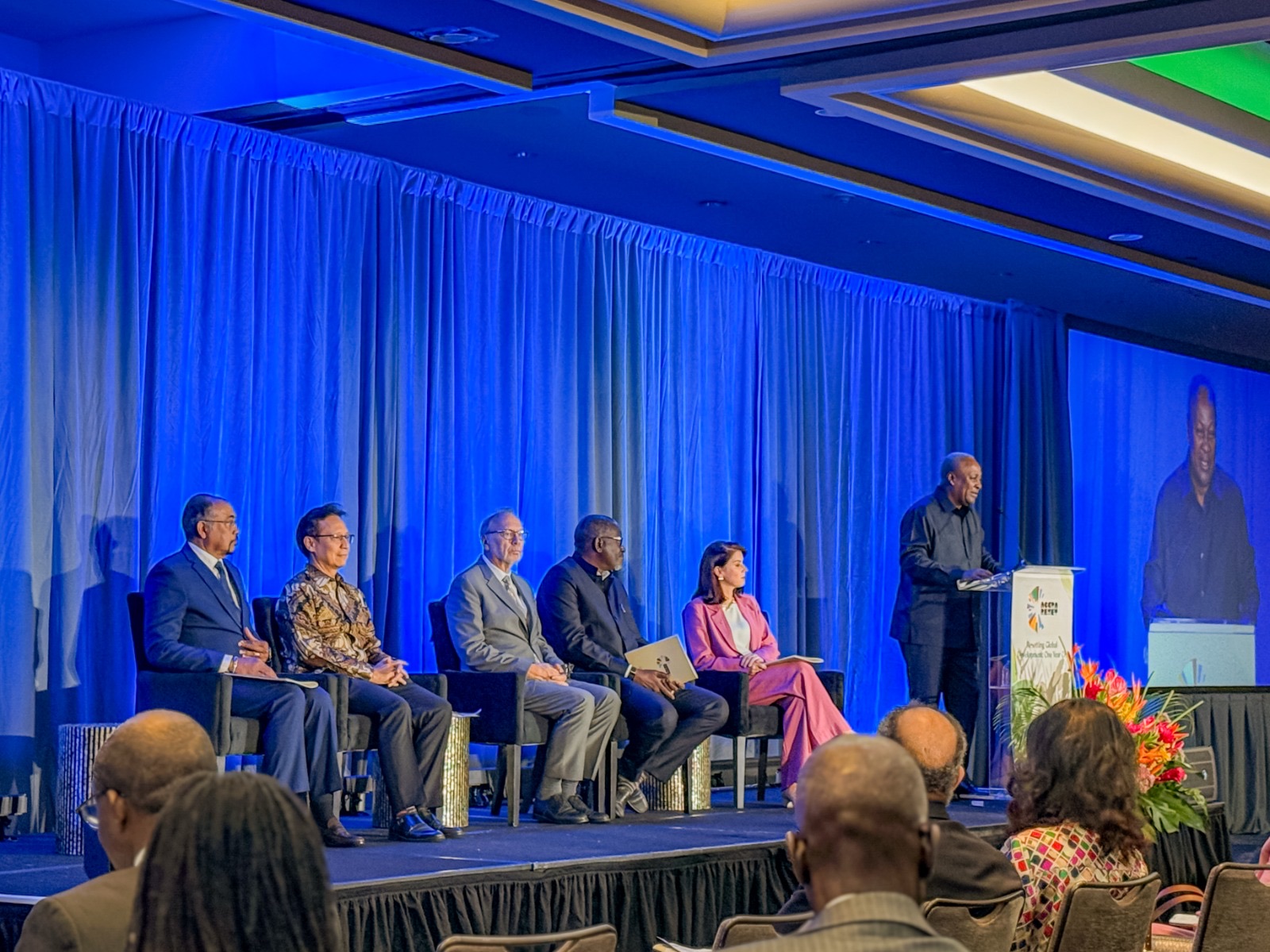 Panel session on stage at the Accra Reset convening